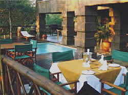 Malelane Accommodation - Game Lodge in Malelane - Grand Kruger Lodge - breakfast on the deck